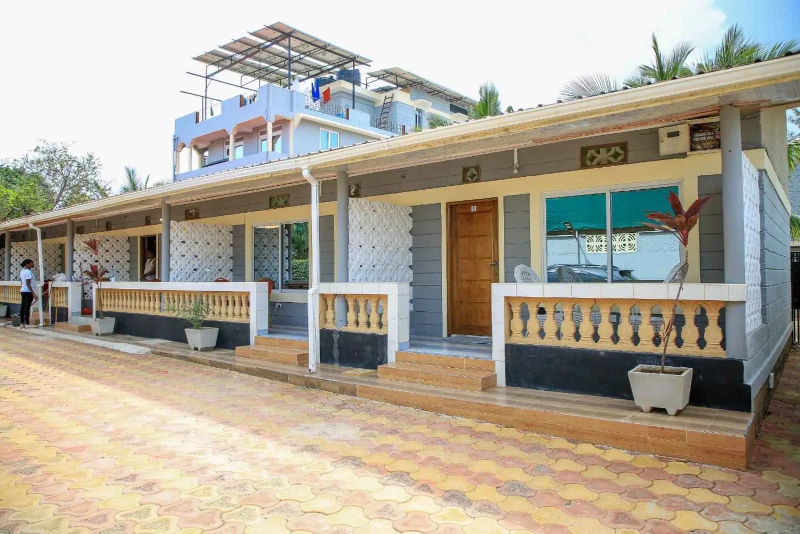 Lemach Hotel exterior with palms and courtyard in Kilifi County